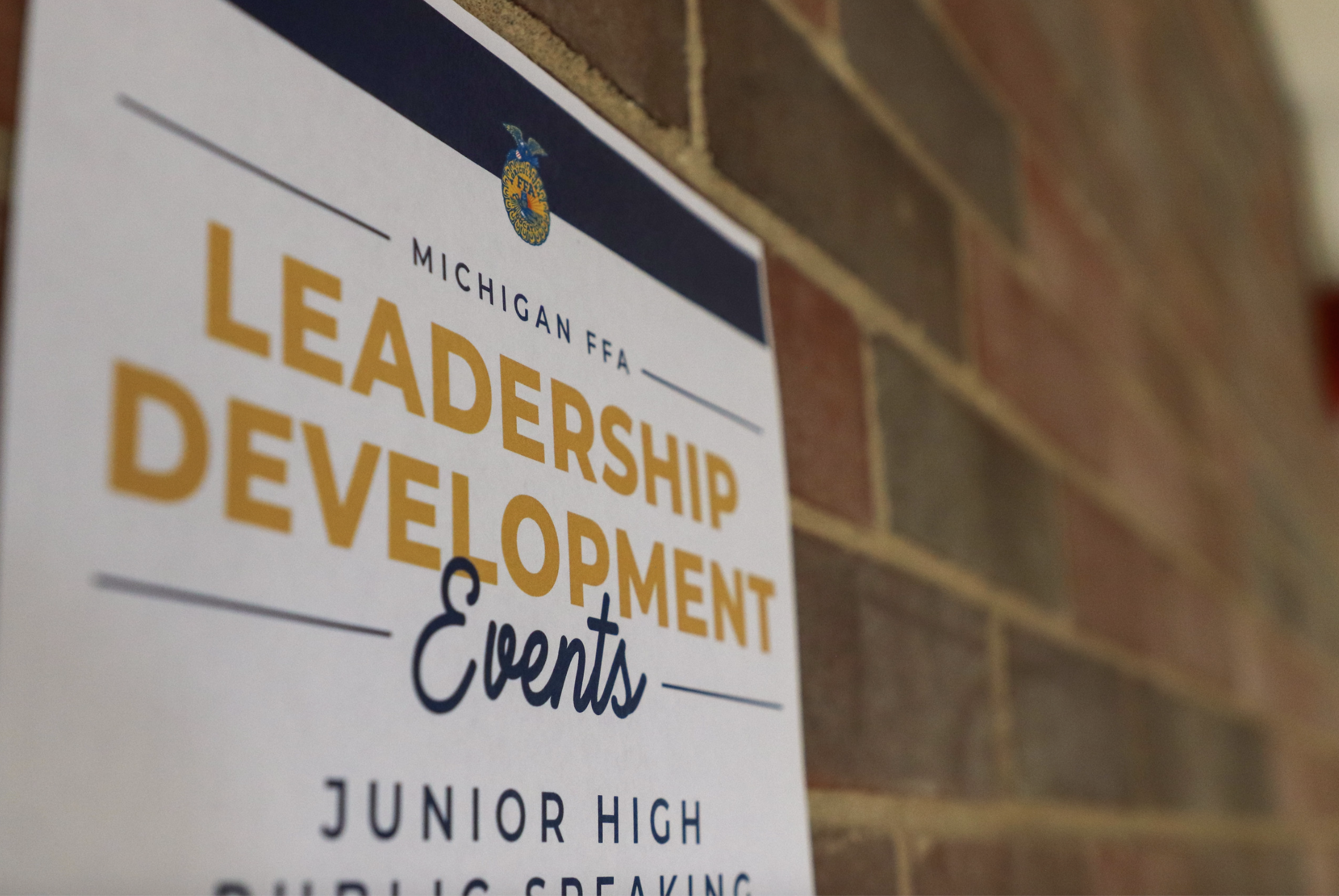 Michigan FFA members and partners reviewing a contest