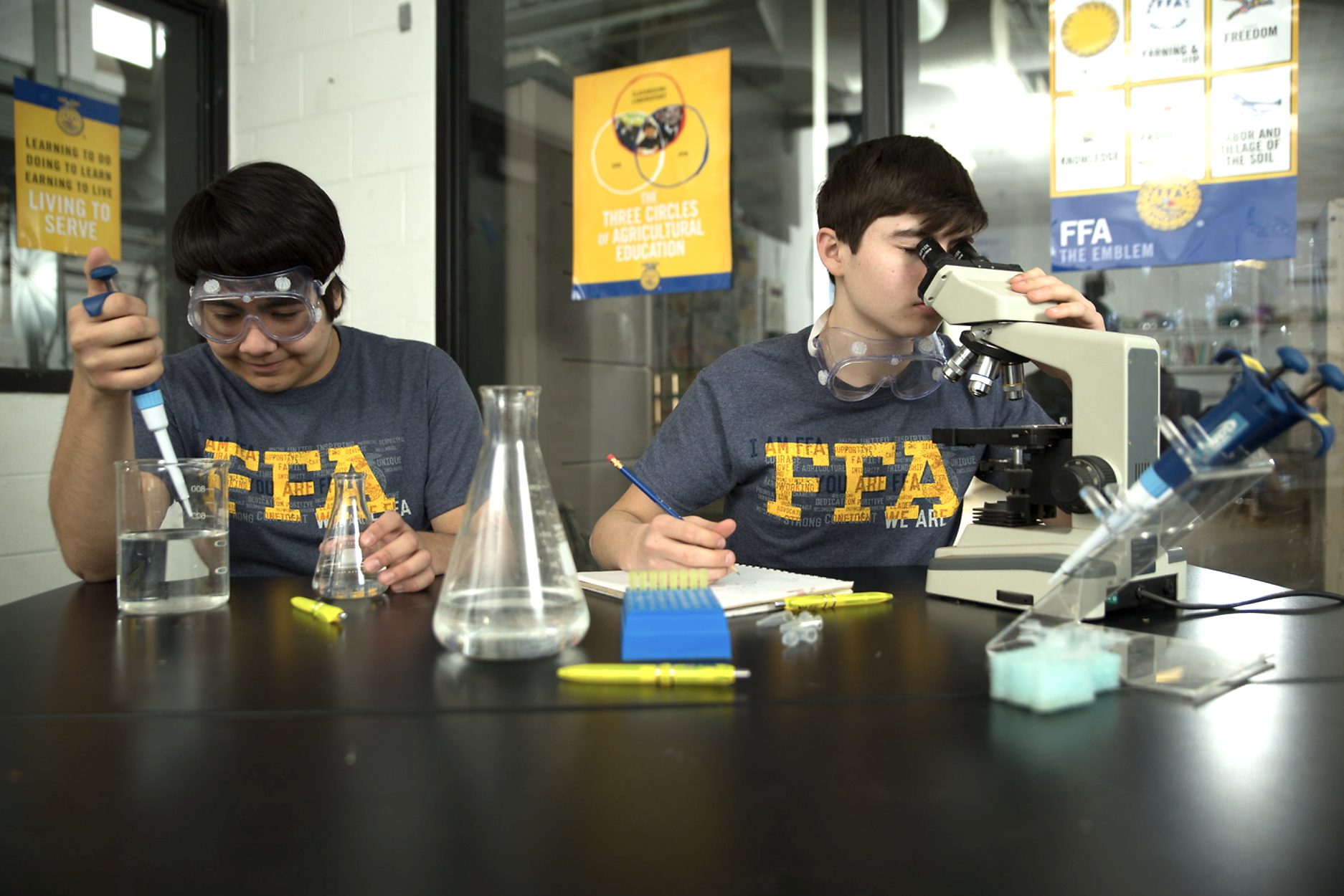 Students participating in classroom and laboratory instruction