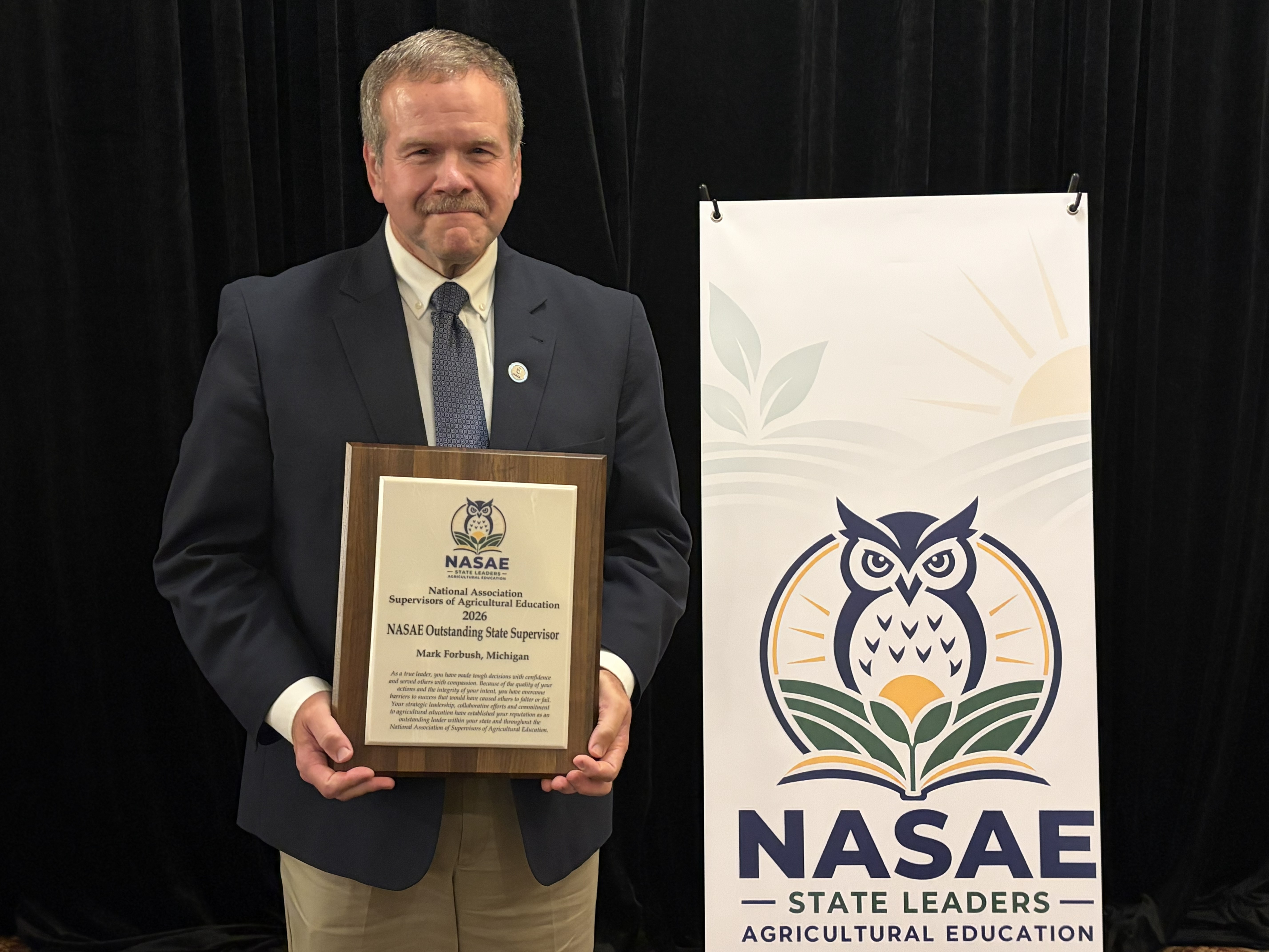 Mark Forbush with NASAE award