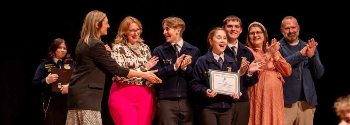 Chapter representatives celebrating award win