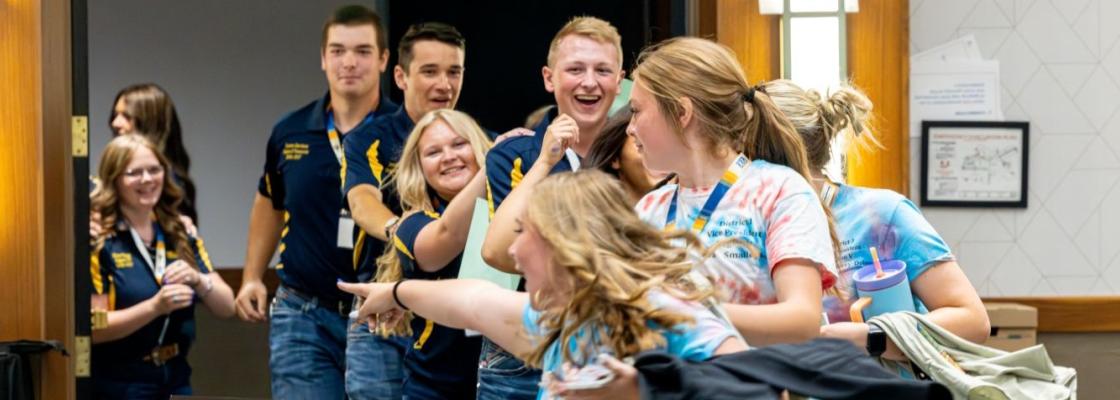 Students attending State Leadership Conference, dancing in the room