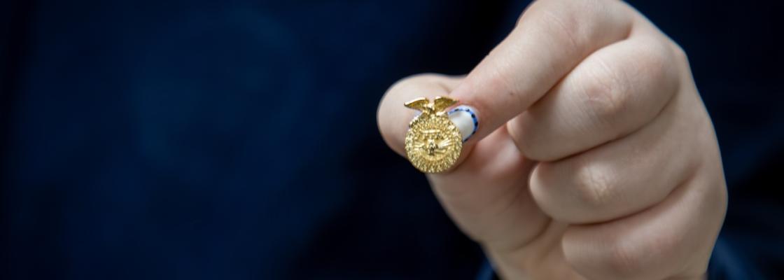 Member holding state degree charm