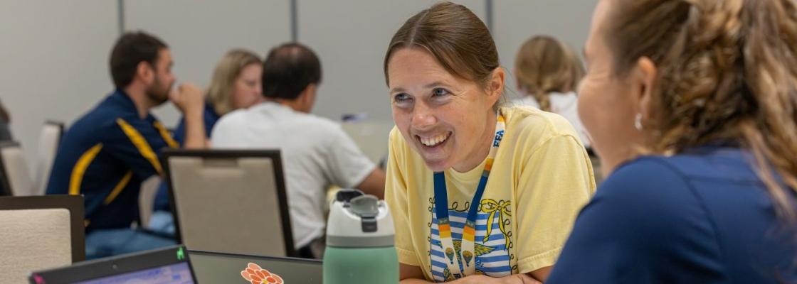 Teachers meeting to discuss contest review